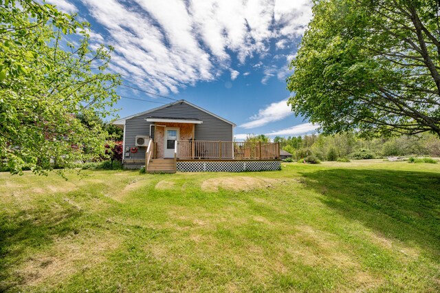 14 Porter St, Searsport, ME 04974 - back of property with a yard and a deck