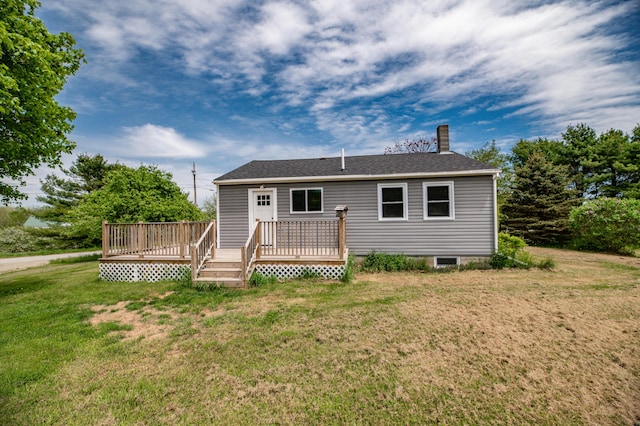 14 Porter St, Searsport, ME 04974 - back of house with a chimney, a lawn, a wooden deck, and roof with shingles