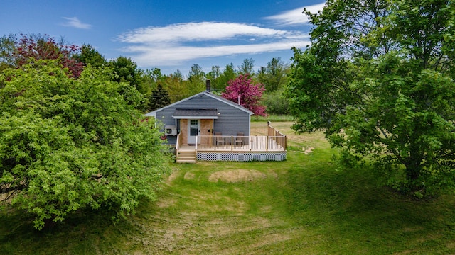14 Porter St, Searsport, ME 04974 - rear view of property featuring a deck and a yard