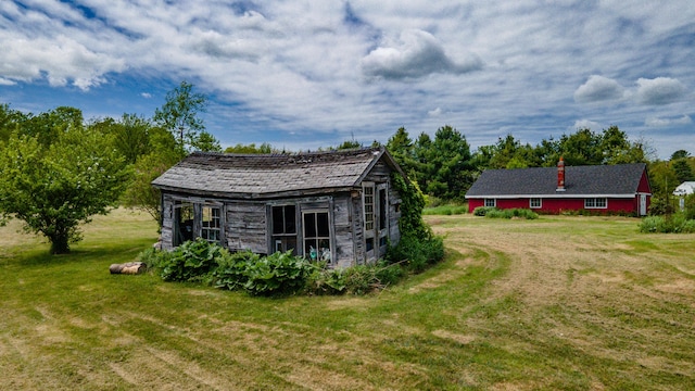 14 Porter St, Searsport, ME 04974 - view of green lawn with an outbuilding
