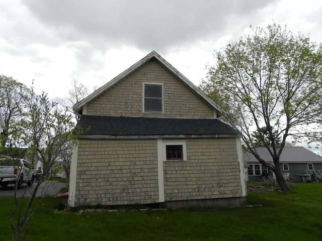 view of property exterior featuring a yard