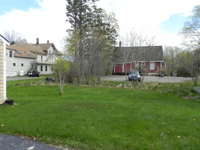 view of yard with a garage