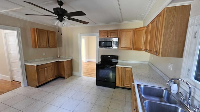 kitchen with light hardwood / wood-style floors, ornamental molding, electric range, sink, and ceiling fan