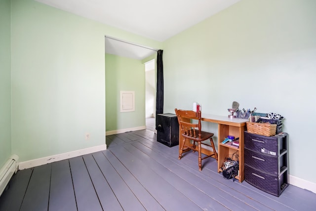 office with hardwood / wood-style floors and a baseboard radiator