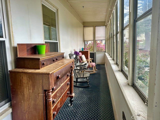 sunroom with plenty of natural light