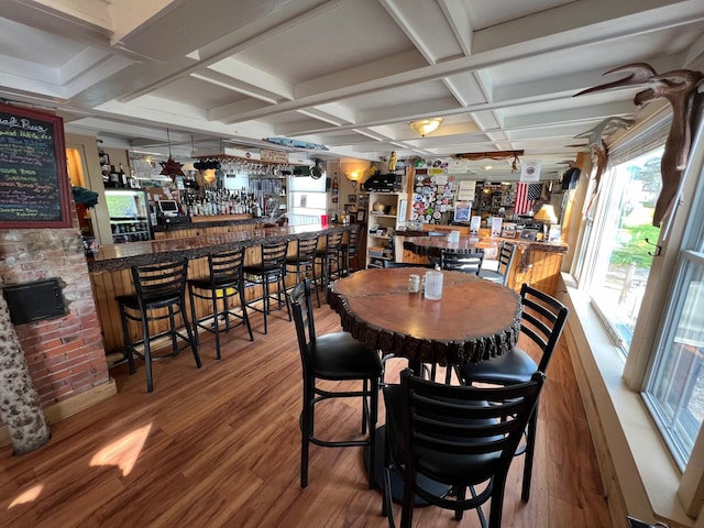 9 Tenney Hill Rd, Monson, ME 04464 - dining room with beam ceiling, hardwood / wood-style flooring, bar area, and coffered ceiling