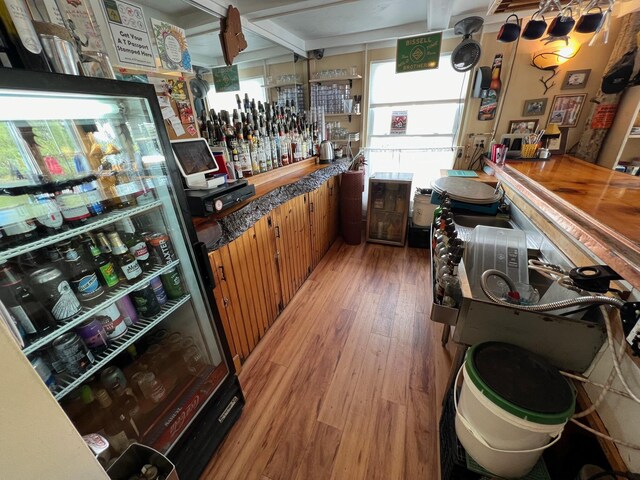 9 Tenney Hill Rd, Monson, ME 04464 - interior space with beam ceiling and wood-type flooring
