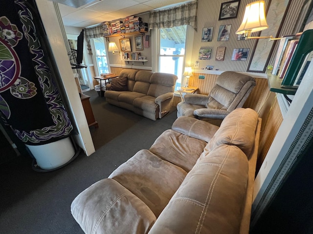 9 Tenney Hill Rd, Monson, ME 04464 - living room featuring carpet floors and a paneled ceiling