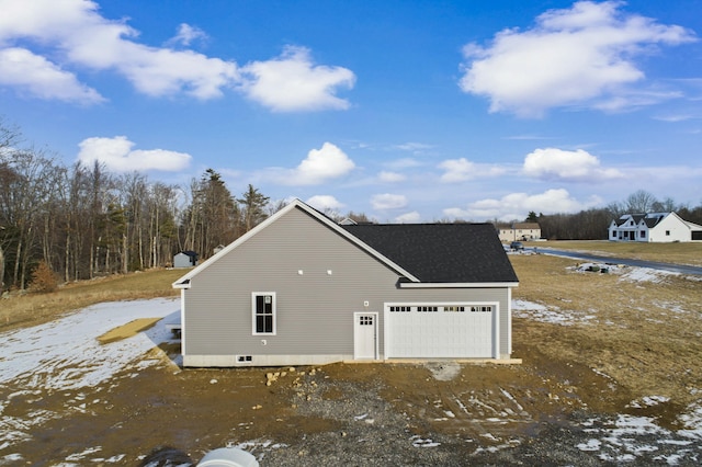 view of home's exterior with a garage