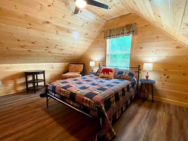 bedroom featuring ceiling fan, hardwood / wood-style floors, wood ceiling, wooden walls, and lofted ceiling