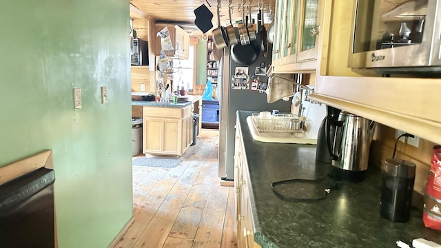 kitchen featuring light brown cabinets and light wood-type flooring