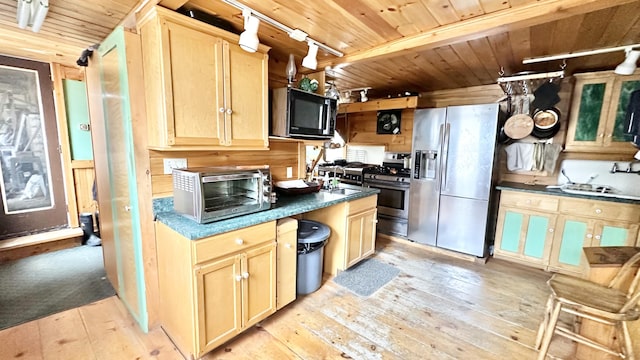 kitchen with light brown cabinetry, light wood-type flooring, stainless steel appliances, and wood ceiling