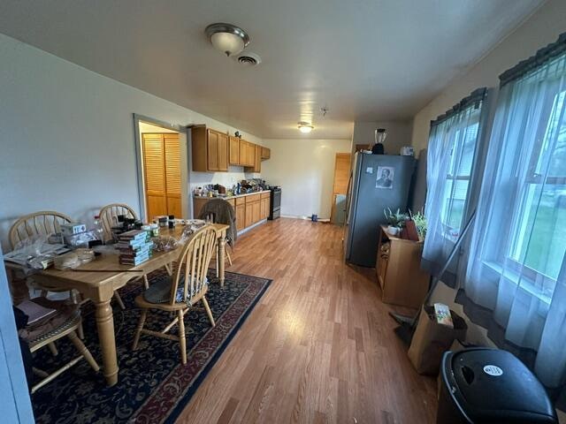 dining room with light wood-type flooring