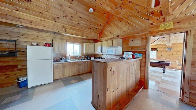 kitchen with white appliances, wooden ceiling, light tile floors, and light brown cabinets