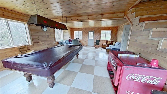 game room featuring tile floors, billiards, and wood walls