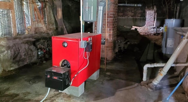 utility room featuring electric water heater