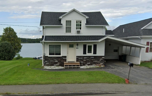 view of front facade featuring a carport and a front lawn