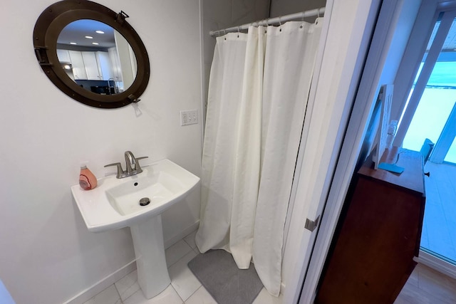 bathroom featuring tile flooring