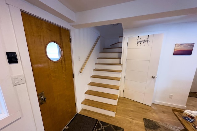 entrance foyer with hardwood / wood-style floors