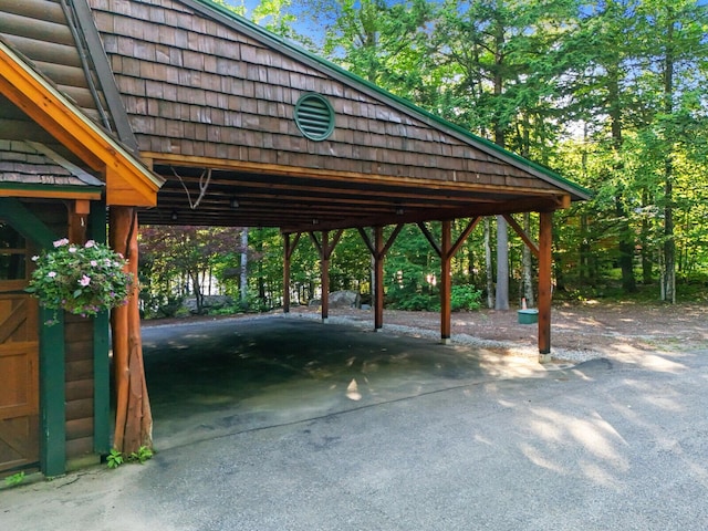 surrounding community with a carport and driveway