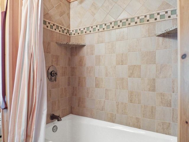 full bath with shower / bathtub combination with curtain