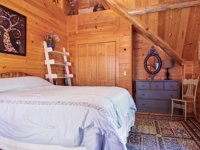 bedroom featuring wood walls