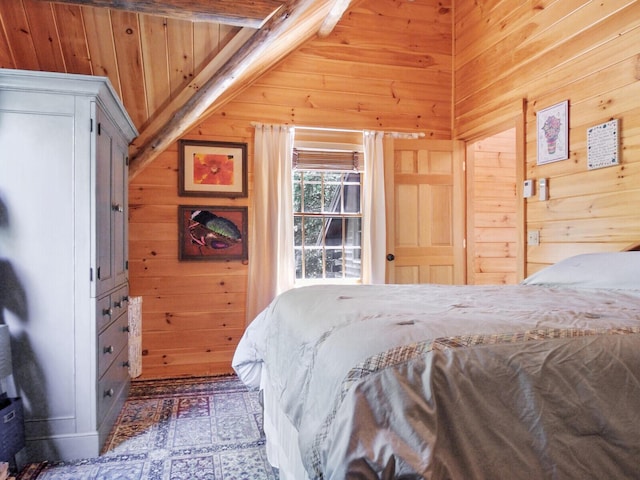 bedroom with vaulted ceiling and wood walls