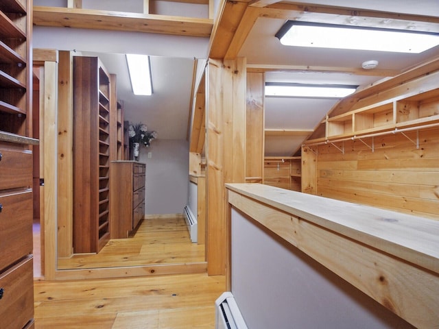 interior space featuring a baseboard radiator and wood-type flooring