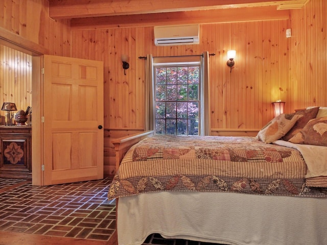 bedroom featuring brick floor, wooden walls, beamed ceiling, and a wall mounted air conditioner
