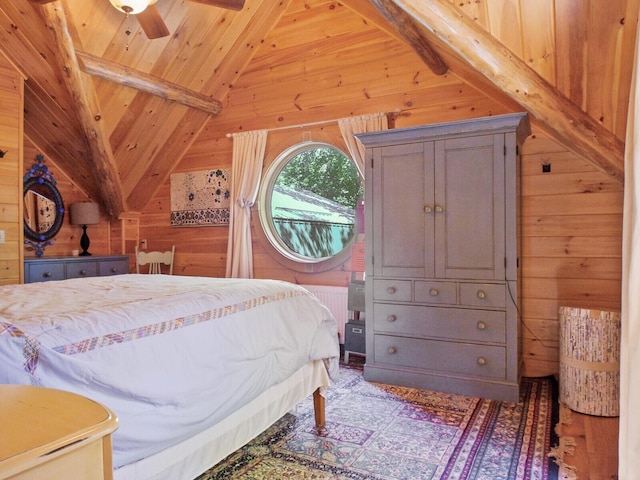 bedroom featuring vaulted ceiling, wooden ceiling, and wooden walls
