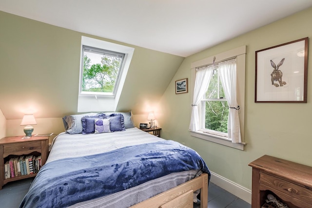 bedroom featuring vaulted ceiling