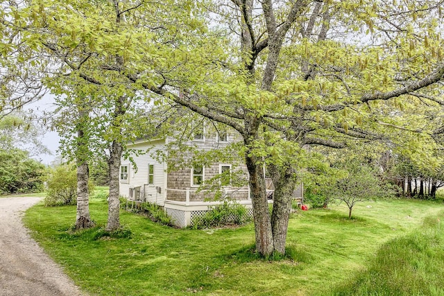 view of yard featuring a wooden deck