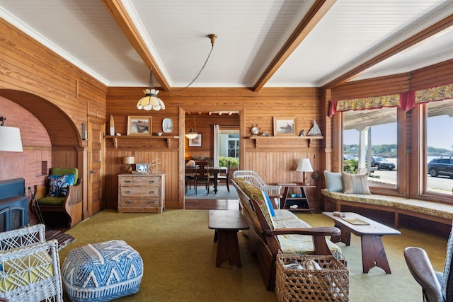 93 Beach Ave, Kennebunk, ME 04043 - living area featuring wooden walls, carpet flooring, crown molding, and beam ceiling