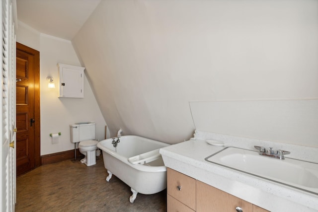 bathroom with vanity, wood-type flooring, a tub, and toilet