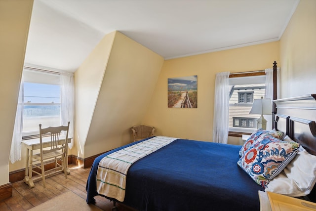 93 Beach Ave, Kennebunk, ME 04043 - bedroom with wood-type flooring and ornamental molding