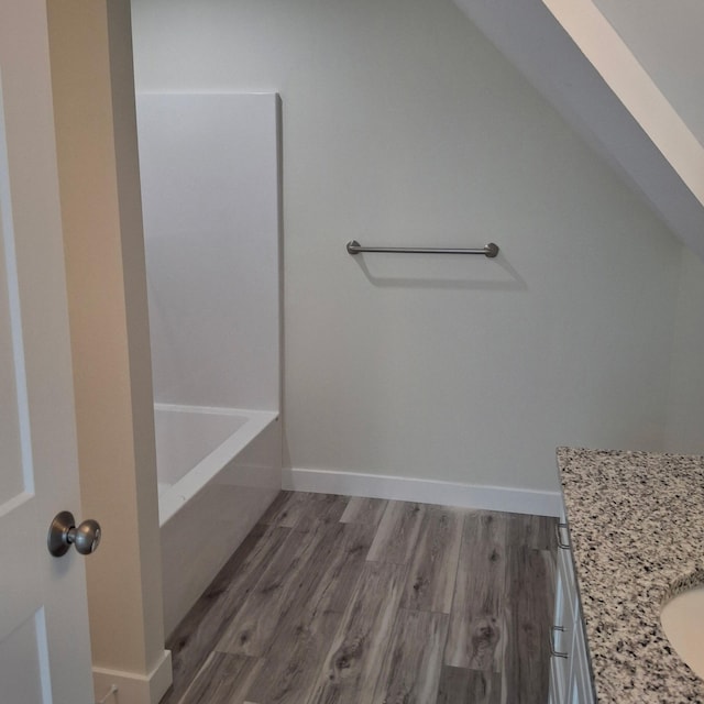 7 Apex Dr Unit 2, Westbrook, ME 04092 - full bath with vanity, a tub to relax in, wood finished floors, baseboards, and a shower