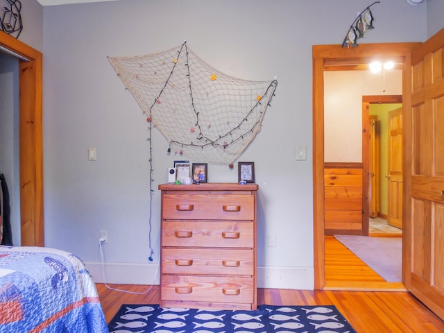 bedroom featuring hardwood / wood-style floors