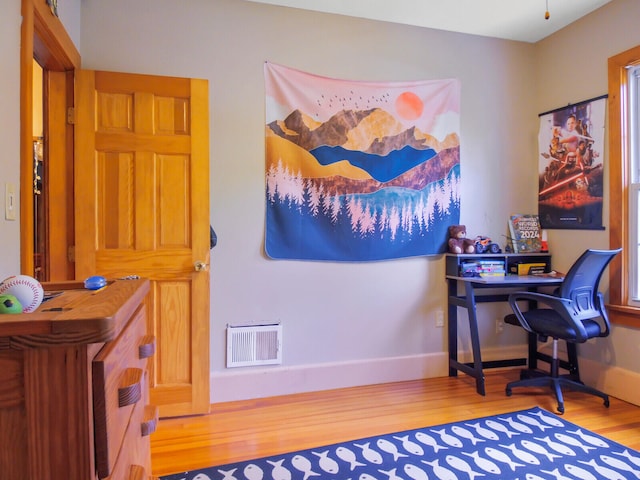 office space featuring hardwood / wood-style floors