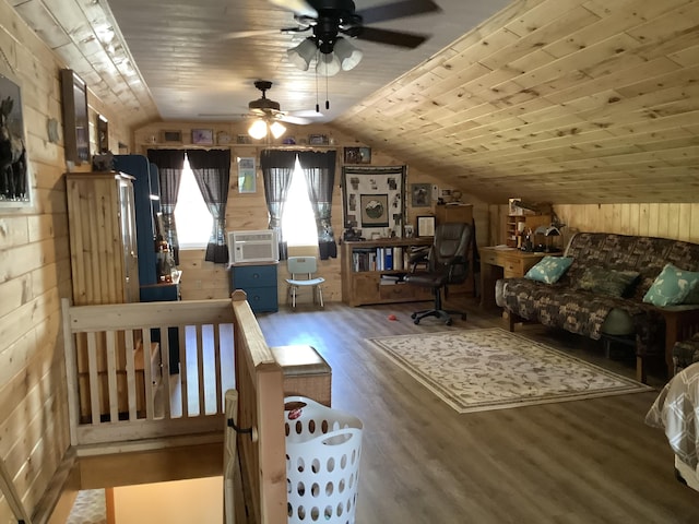 living room with wooden walls, vaulted ceiling, ceiling fan, wood-type flooring, and wood ceiling