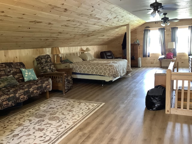 bedroom with ceiling fan, wood ceiling, lofted ceiling, and hardwood / wood-style flooring