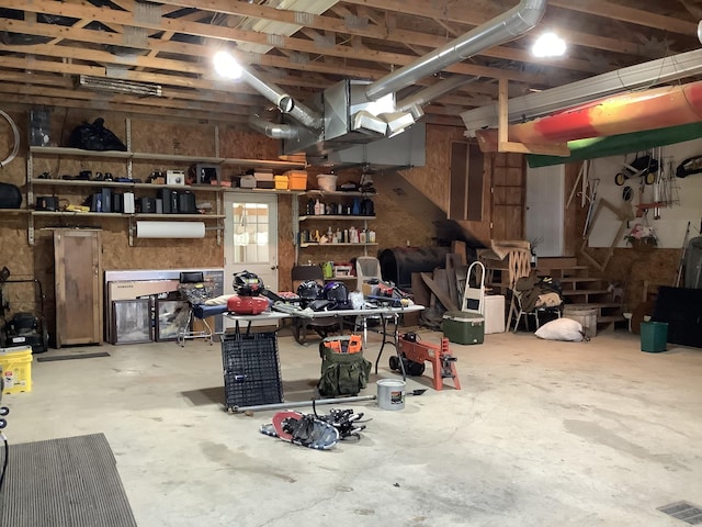 garage with a workshop area