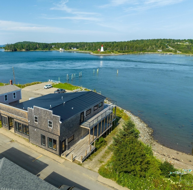 drone / aerial view with a water view