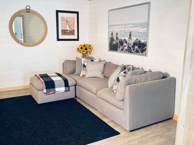 living room with light hardwood / wood-style flooring