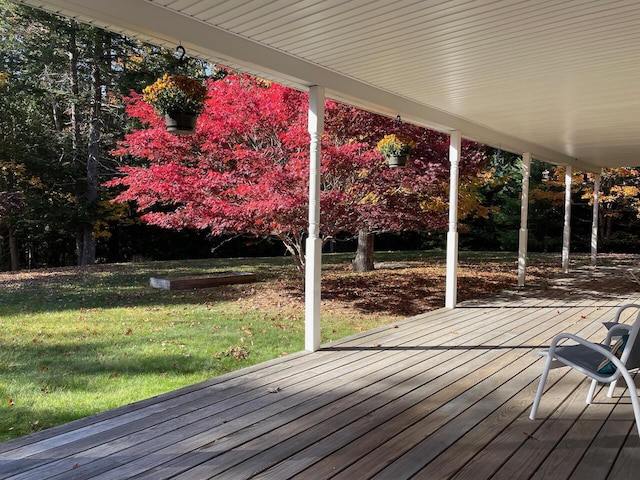 deck featuring a lawn