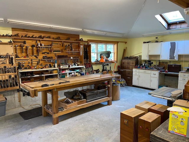 interior space with concrete flooring and a workshop area