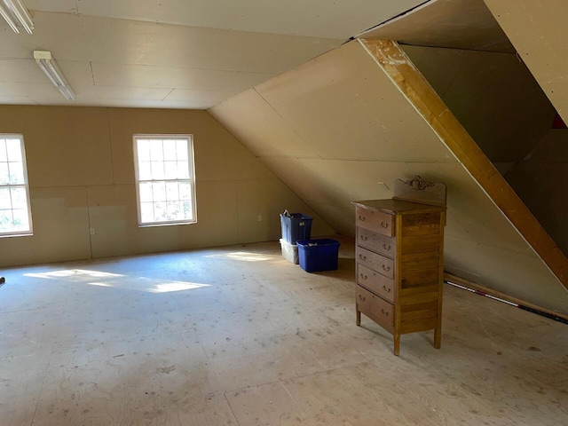 bonus room featuring lofted ceiling