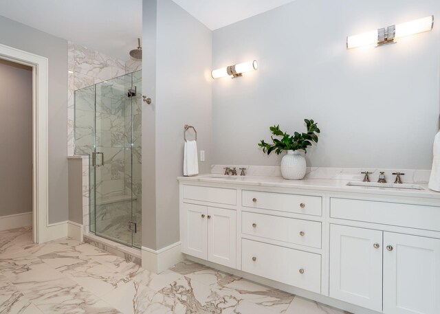 387 Commercial St Unit 709, Portland, ME 04101 - bathroom featuring a sink, marble look tiles, a stall shower, and baseboards
