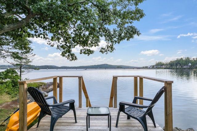 view of dock with a water view