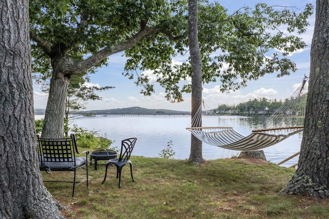 114 Fort Rd, Edgecomb, ME 04556 - dock area featuring an outdoor fire pit and a water view