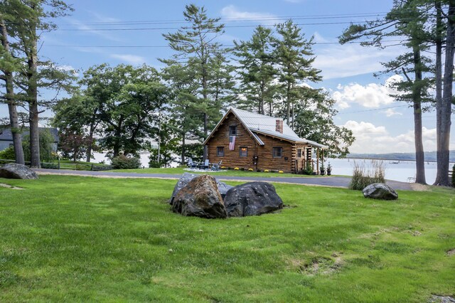 exterior space featuring a water view